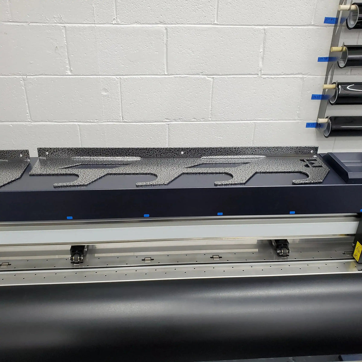 Wall-Mounted Vinyl, Tint, Paper & Cloth Wrap Rack - Modular Storage | Martin Metalwork"