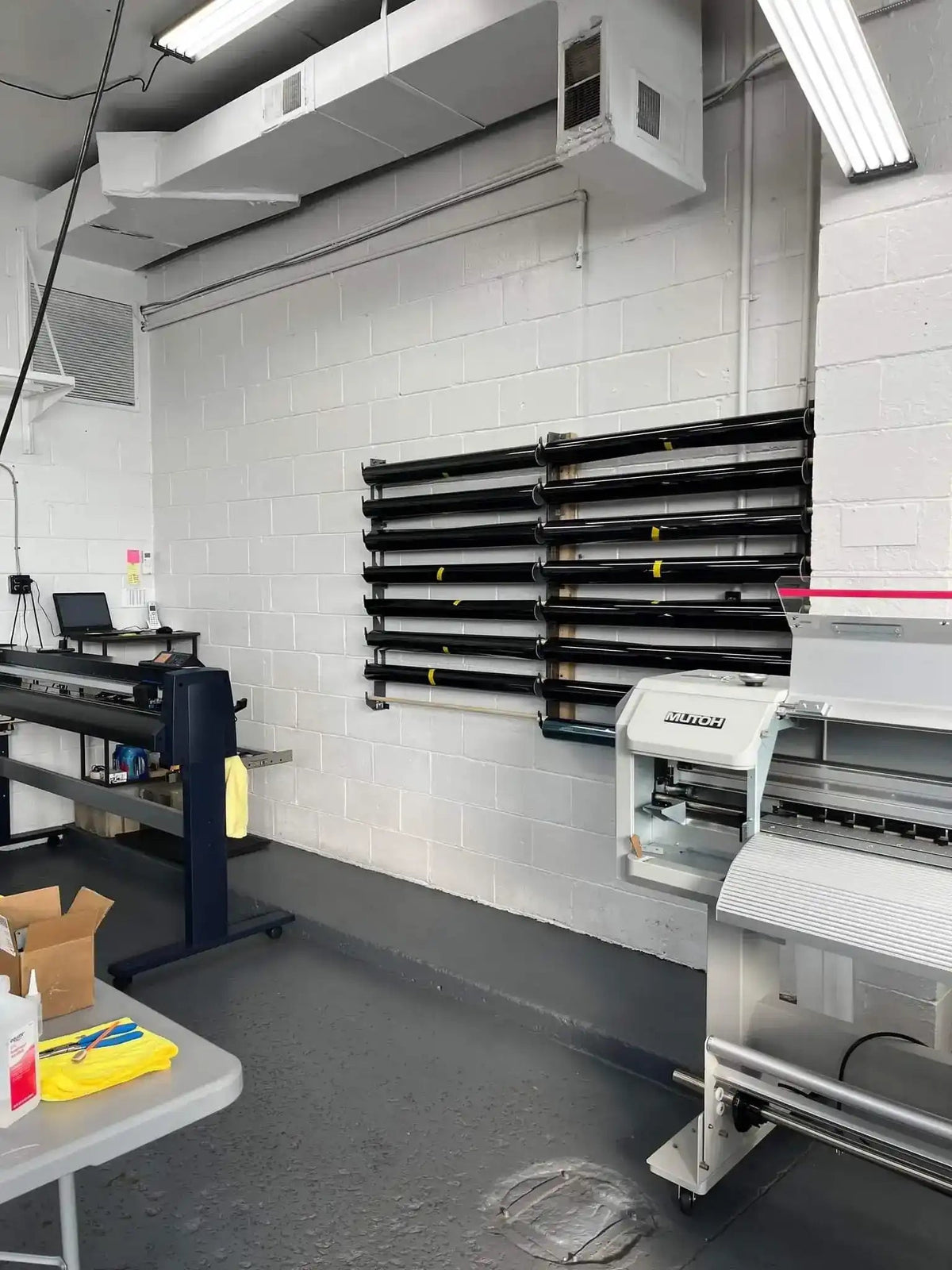 Wall-Mounted Vinyl, Tint, Paper & Cloth Wrap Rack - Modular Storage | Martin Metalwork"