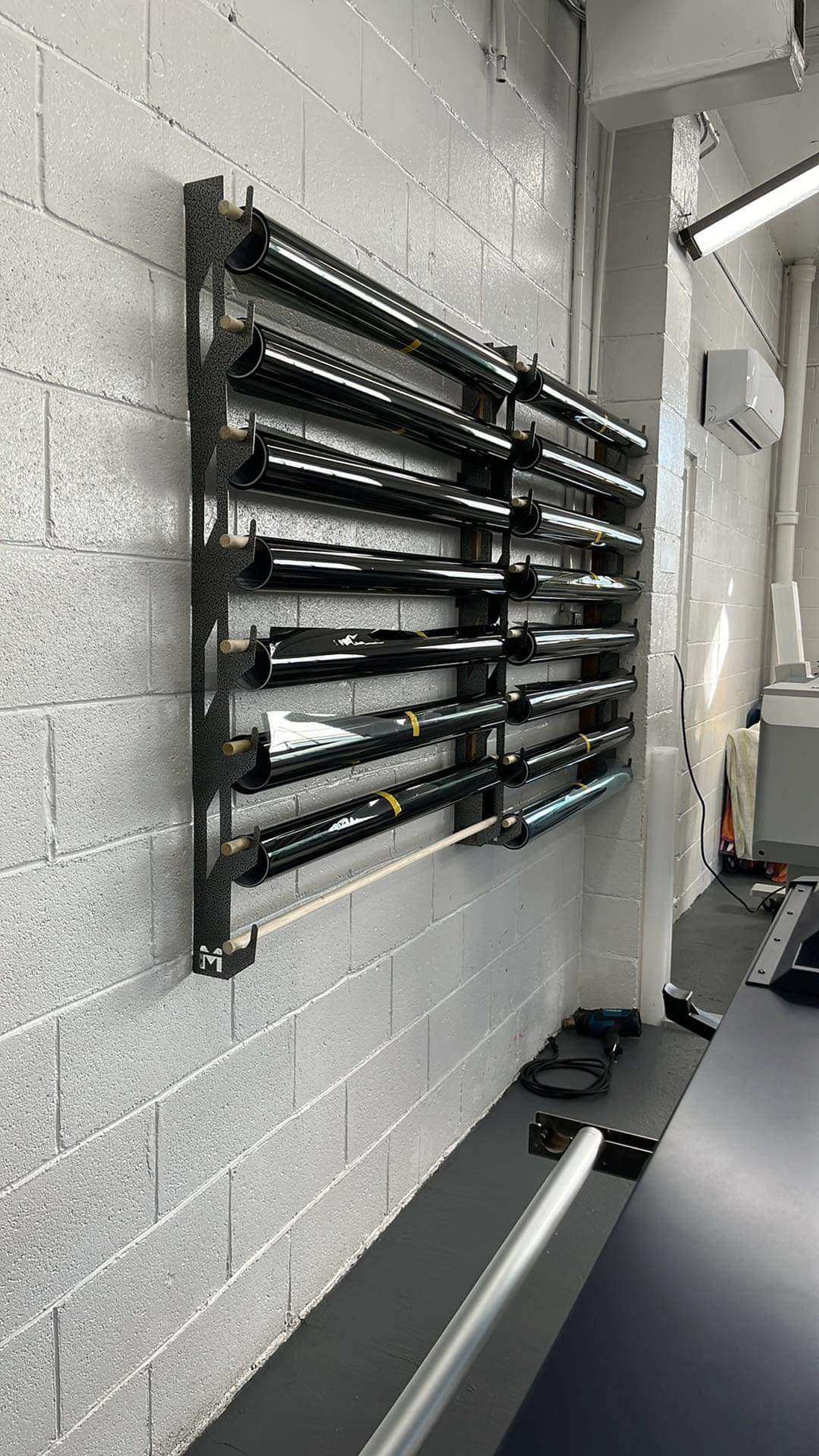 Wall-Mounted Vinyl, Tint, Paper & Cloth Wrap Rack - Modular Storage | Martin Metalwork"