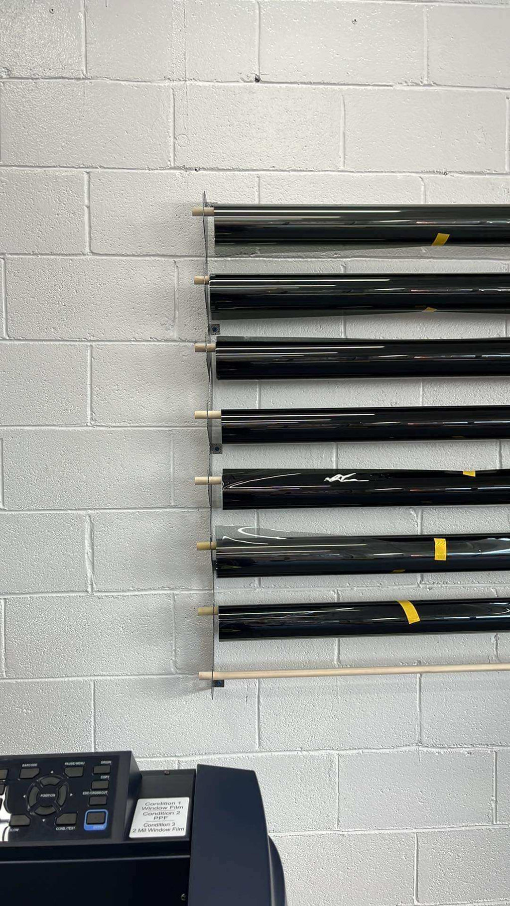 Wall-Mounted Vinyl, Tint, Paper & Cloth Wrap Rack - Modular Storage | Martin Metalwork"